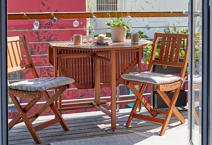 Wooden garden bistro set on balcony 