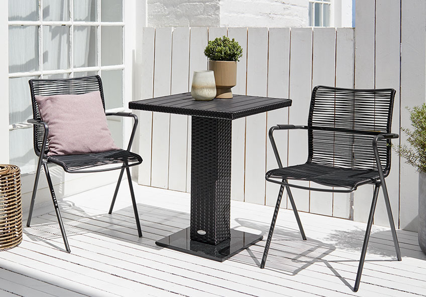 UBBERUP stacking chairs and THY bistro table Garden bistro set on a sunny patio or balcony