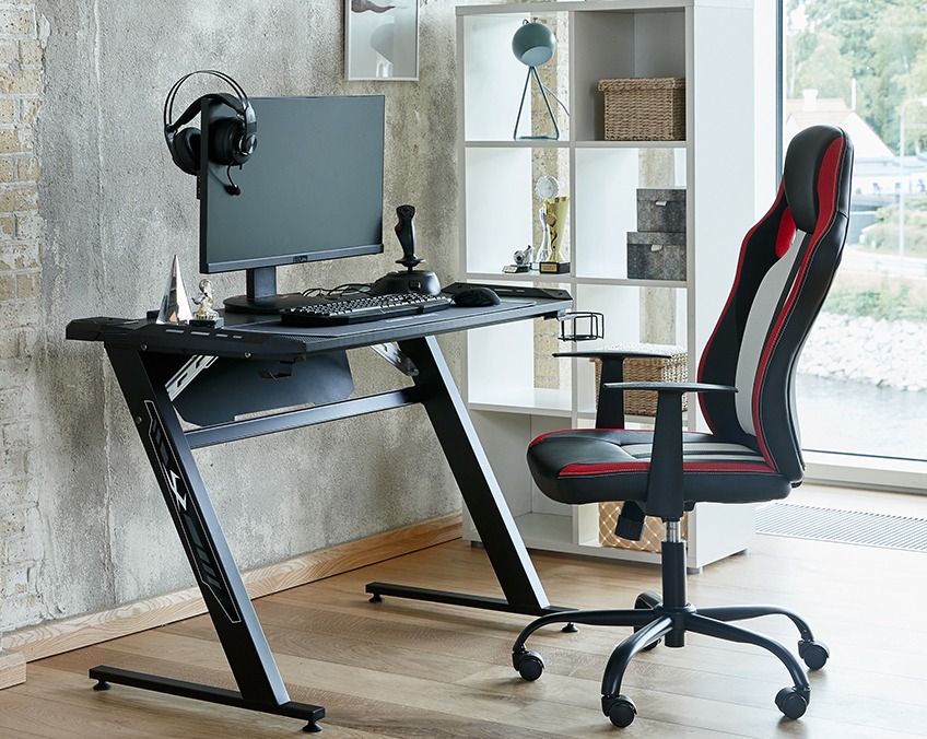 Home office with gaming computer desk and computer gaming chair